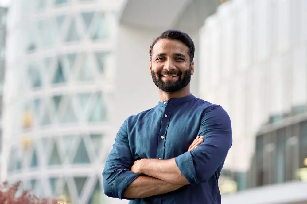 Young man in blue shirt at the university.