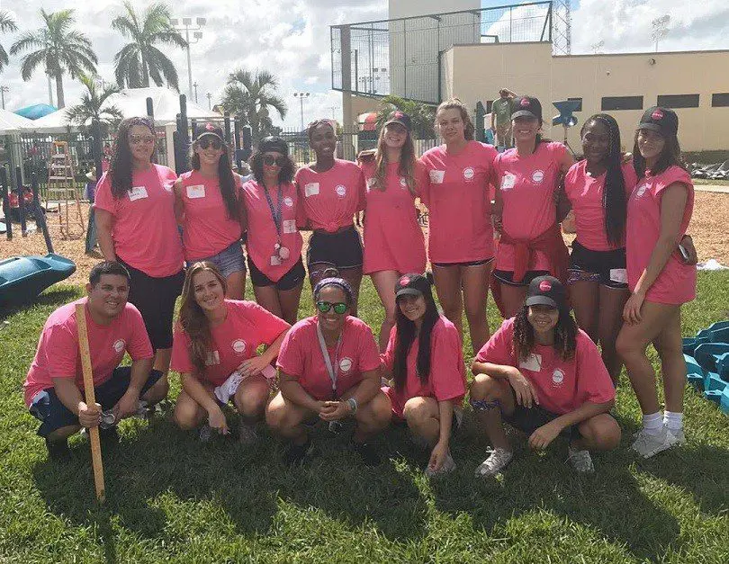 Volleyball team working for the community.