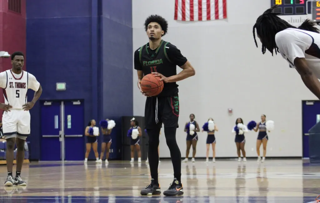 Ray Daniel Parrish at free-throw line ready to shoot the ball.