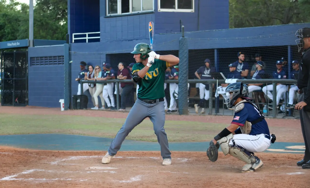 FNU outfielder Gino Bellantoni about to hit versus St. Thomas University.