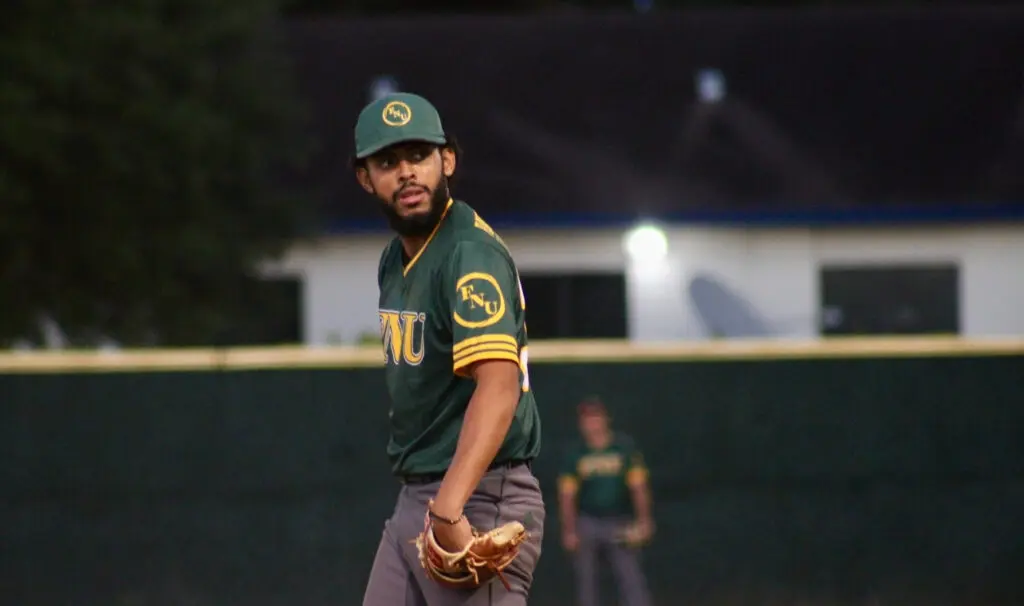 FNU pitcher Juan Pablo Arellano getting set to throw.