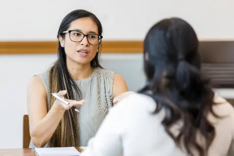 header image of forensic psychologist talking to client