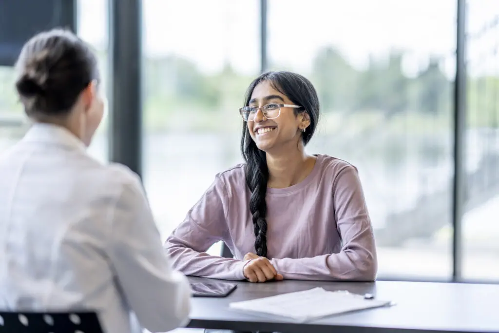 dental assistant candidate in an interview with dentist 