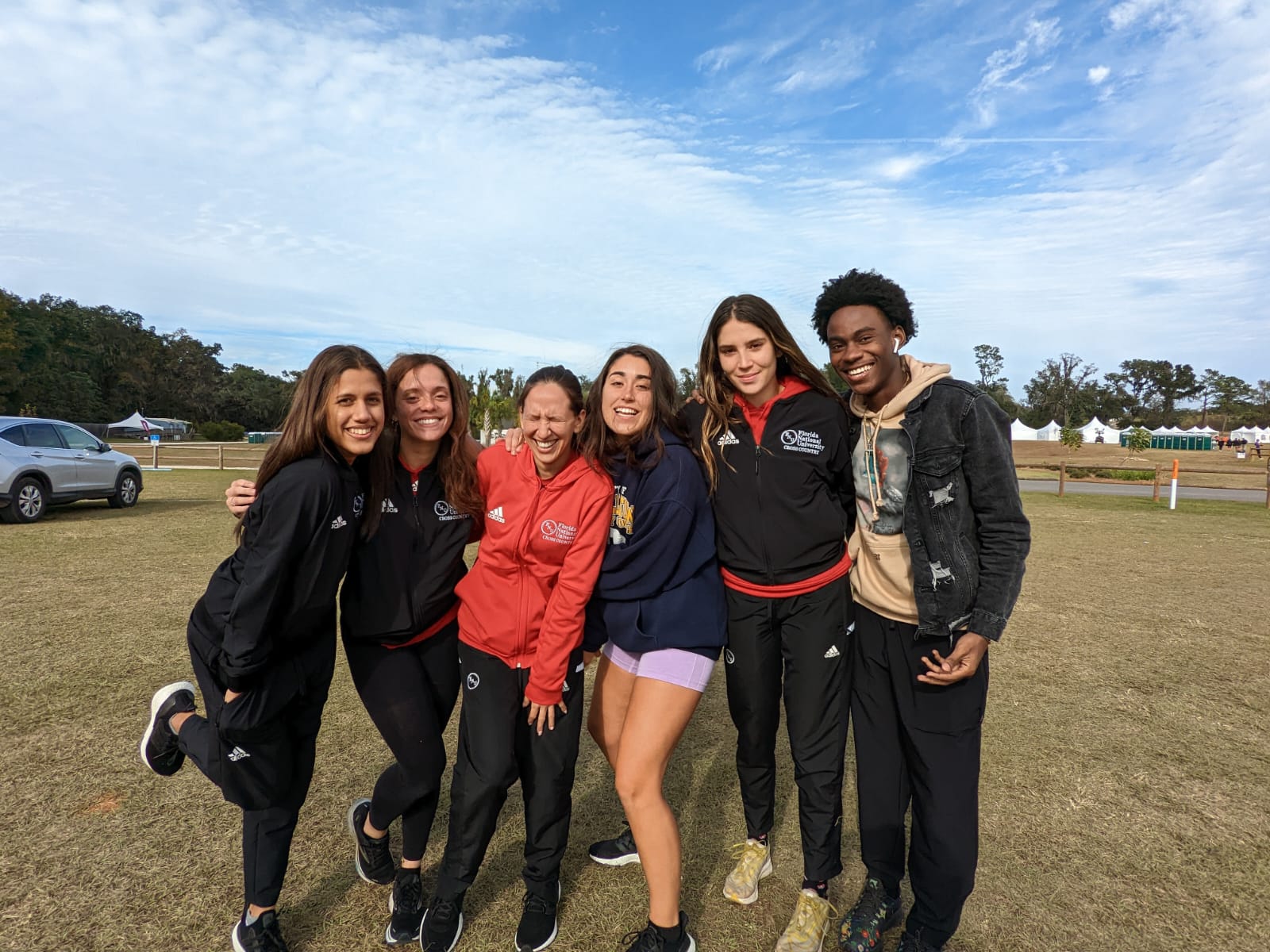 FNU cross country runners share a photo before competing in the NAIA Championships.